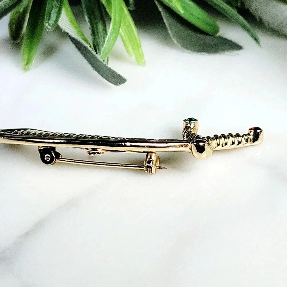 Vintage Gerry's Sword Brooch Pin Signed Rhinesone Cutlas Handle Goldtone…